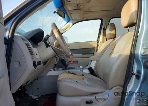 2009 Mercury Mariner z USA, uszkodzony, nr VIN 4M2CU91G09KJ10821